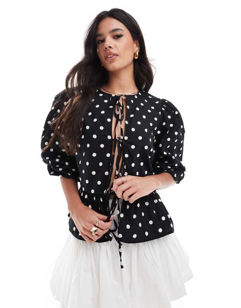 ASOS ASOS DESIGN cotton poplin peplum tie shirt top in black and white spot print