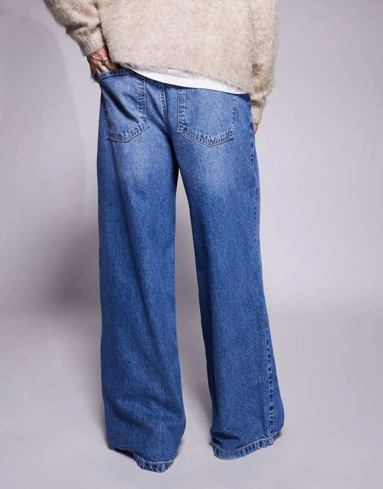 ASOS ASOS DESIGN super baggy jeans with back print in mid wash blue 3