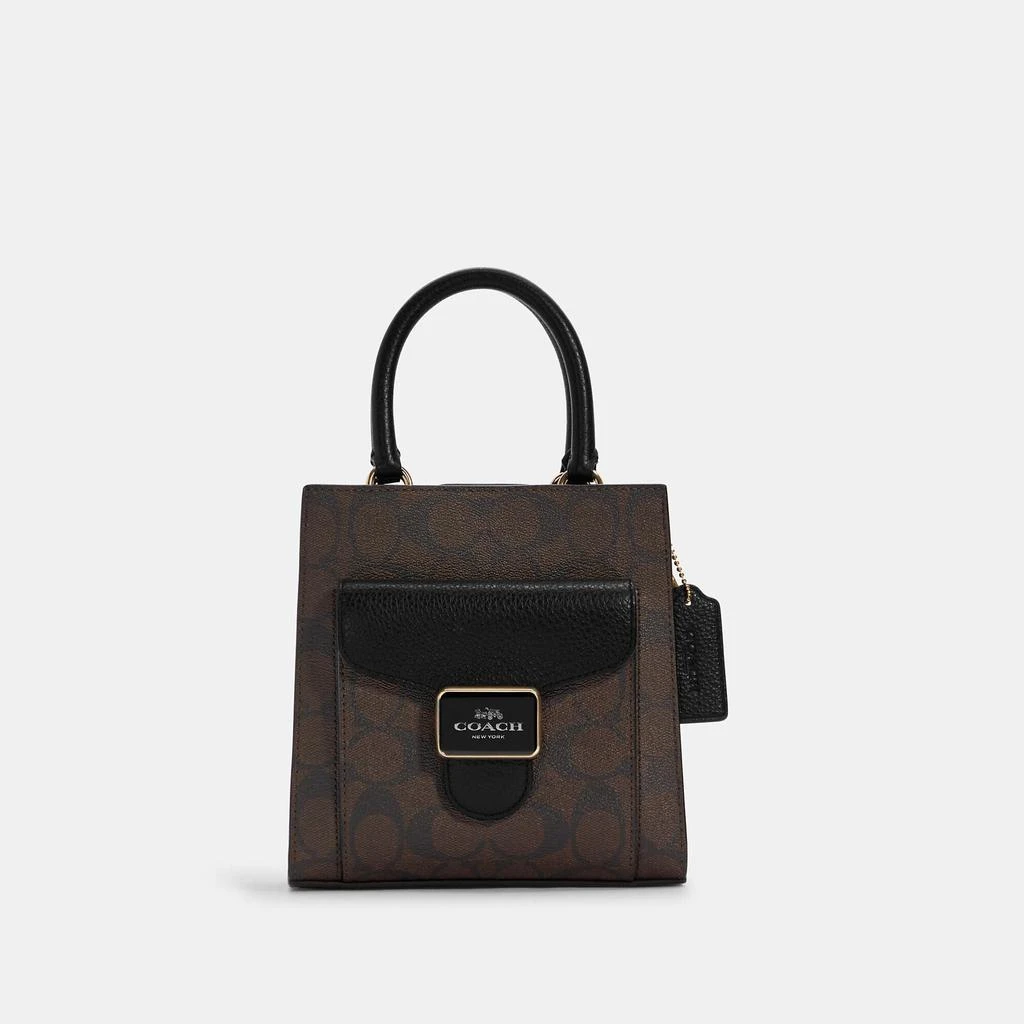 Coach Coach Outlet Mini Pepper Crossbody In Signature Canvas 1