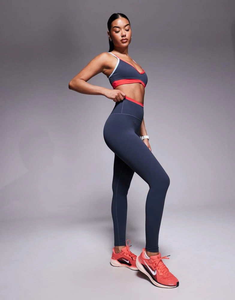 PE Nation PE Nation Vita full length legging in marine blue and strawberry 1