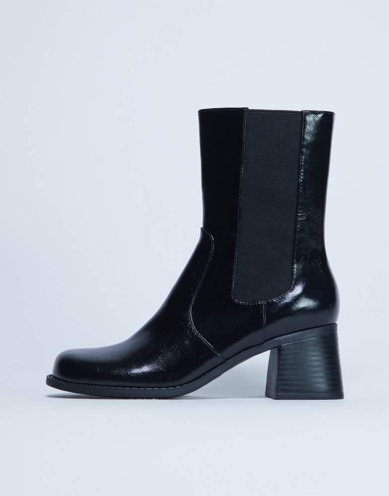 Shop Topshop Nisha block heeled chelsea boots in black on
