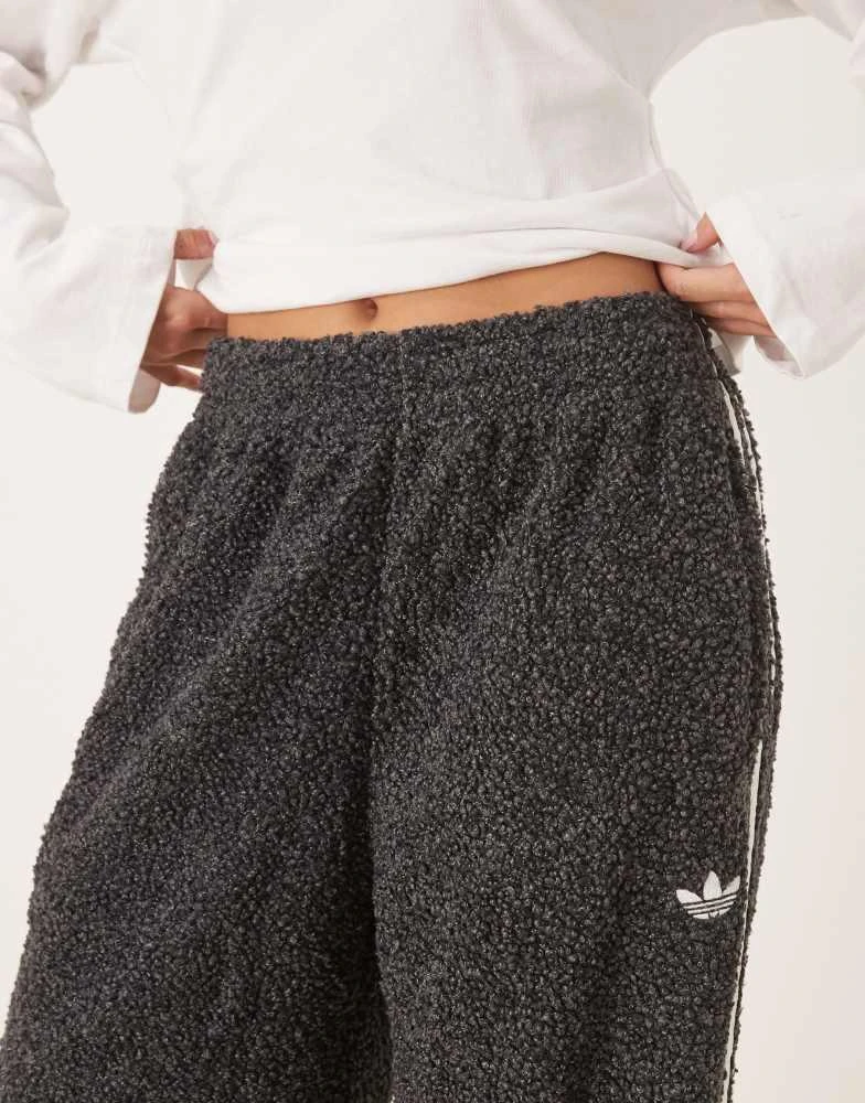 Adidas adidas Originals Boucle Firebird track pants in black 3