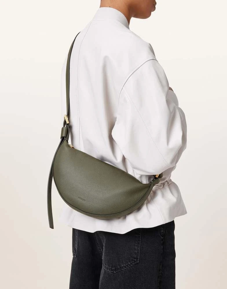 ALL SAINTS AllSaints leather half moon crossbody bag in military green 1