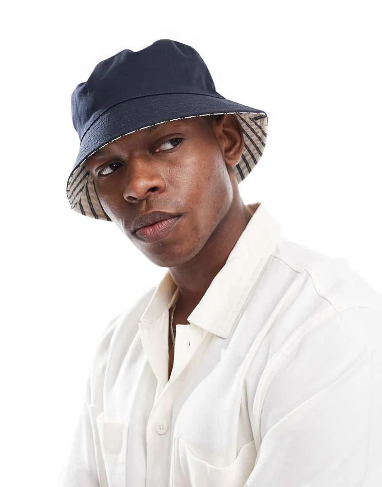 ASOS ASOS DESIGN reversible bucket hat in navy stripe 1
