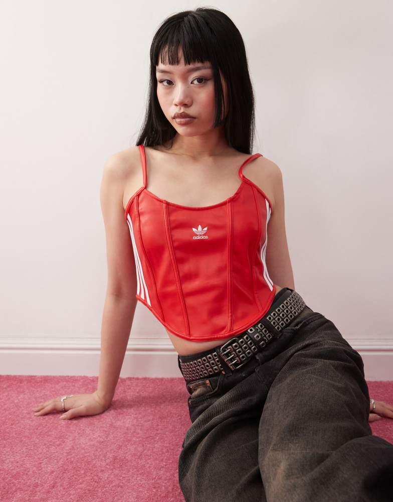 adidas Originals Firebird corset in black – On Sale Now with