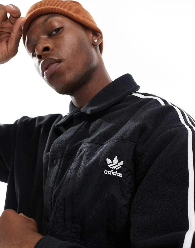 Adidas adidas Originals polar shirt in black 4