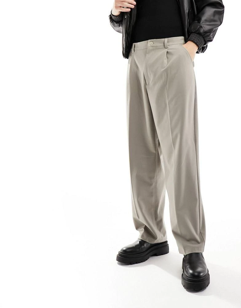 Bershka Bershka baggy tailored trouser in beige 1