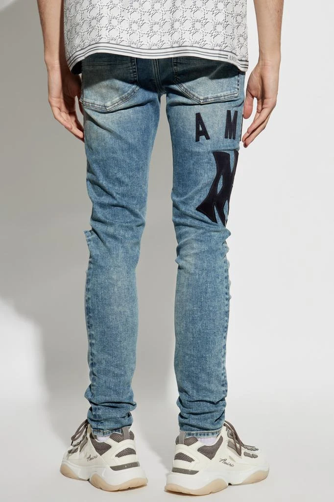 AMIRI Jeans with logo 4
