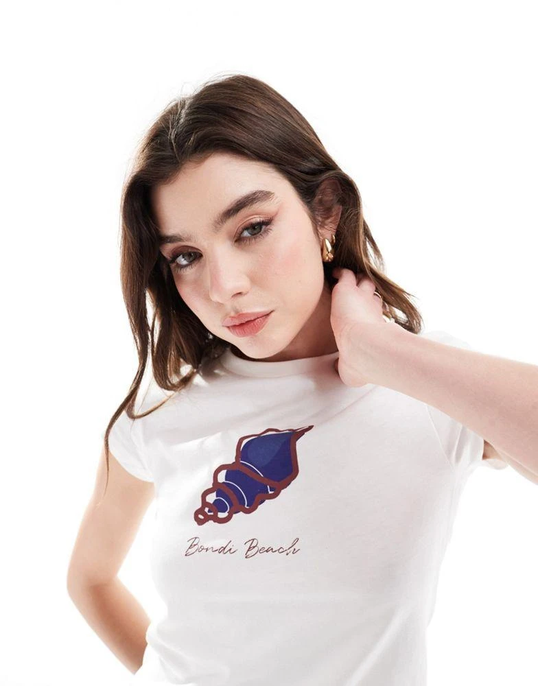 ASOS ASOS DESIGN baby tee with bondi beach shell graphic in cream 1