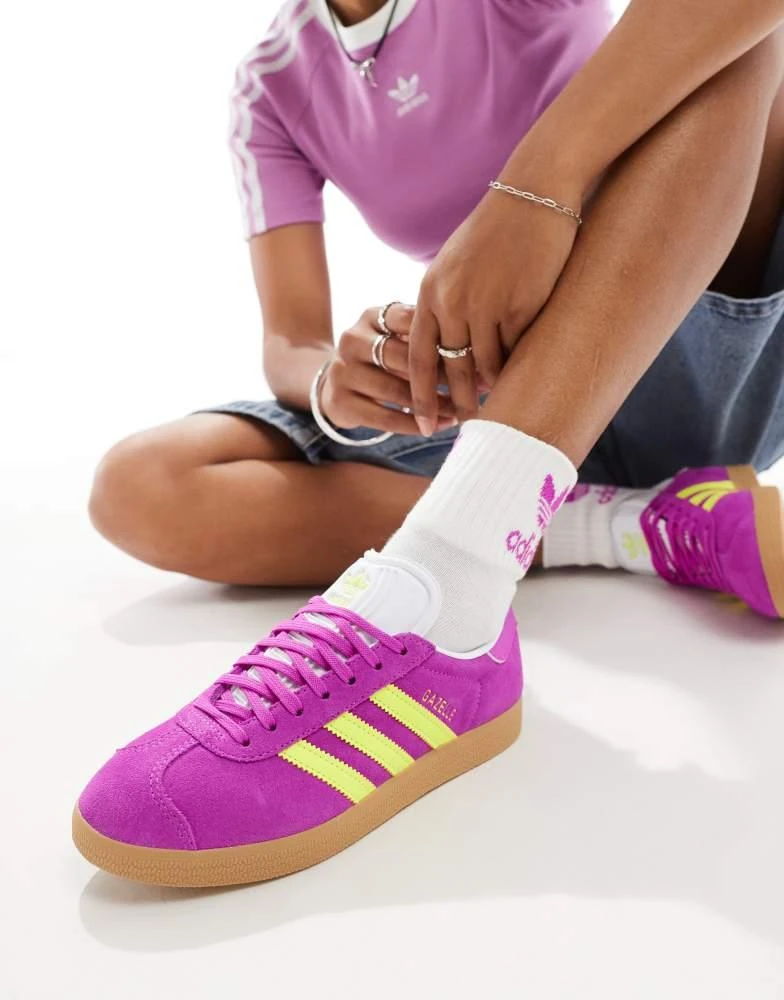 Adidas adidas Originals Gazelle trainers in pink and yellow with gum sole 1