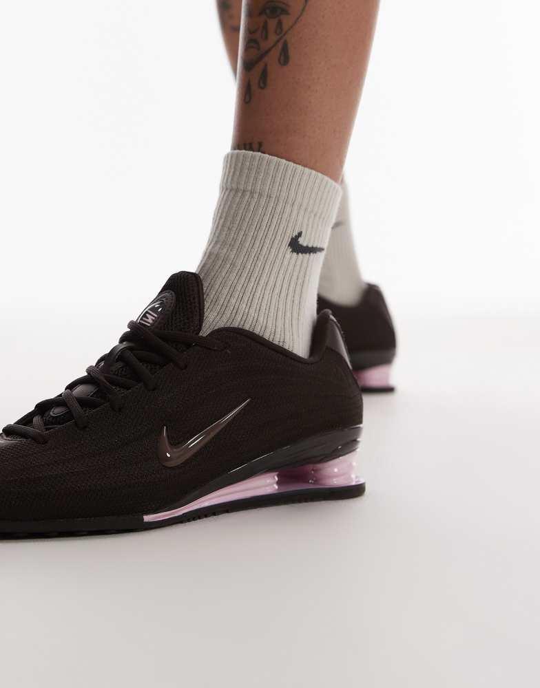 Shop Nike Shox Z trainers in brown and pink on Sale at BeyondStyle