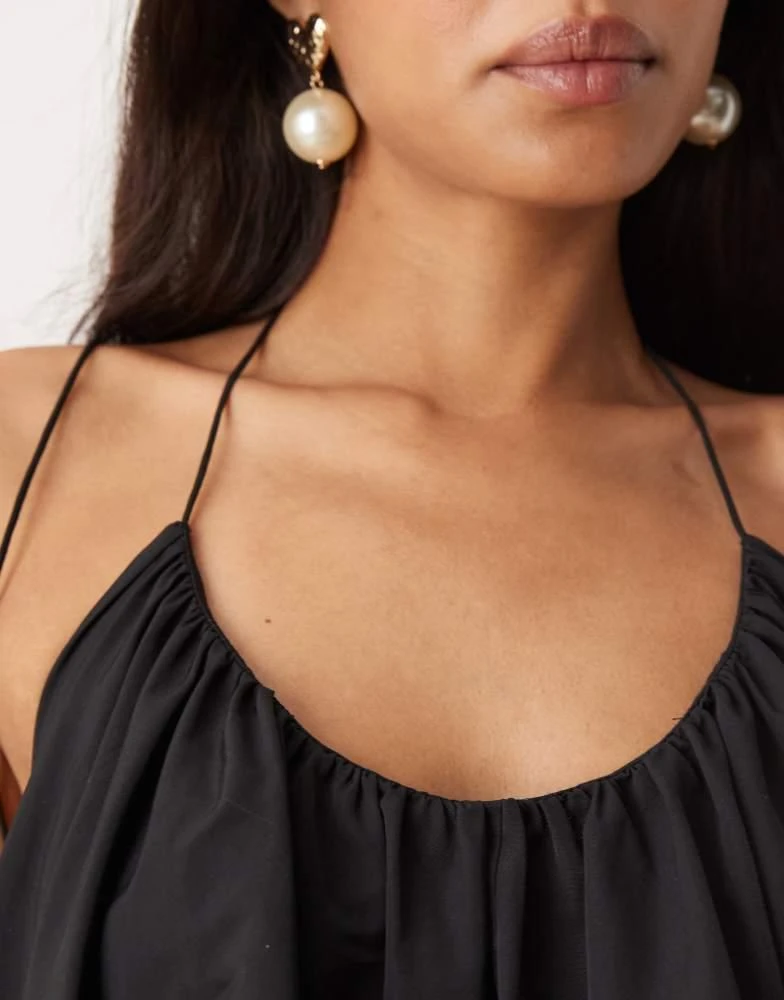 ASOS ASOS DESIGN trapeze cami mini dress with puff ball skirt in black 3