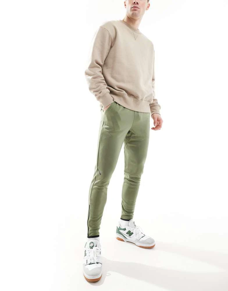 New Balance New Balance Tenacity knit training pant in green 1