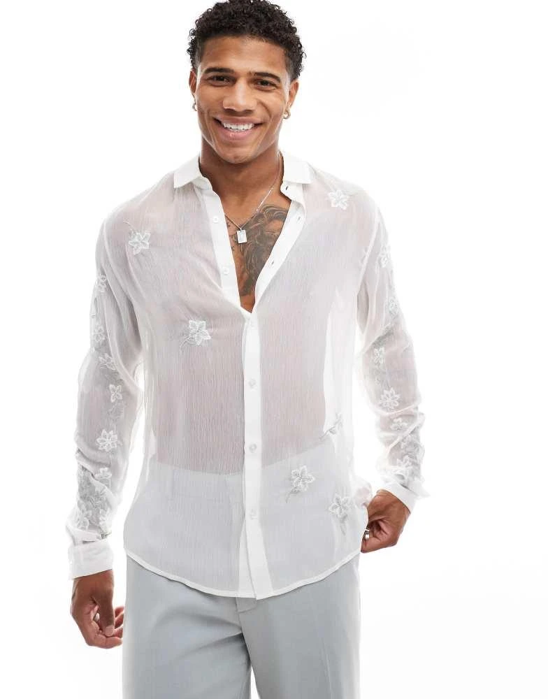 ASOS ASOS DESIGN sheer regular shirt with floral embroidery in white 1