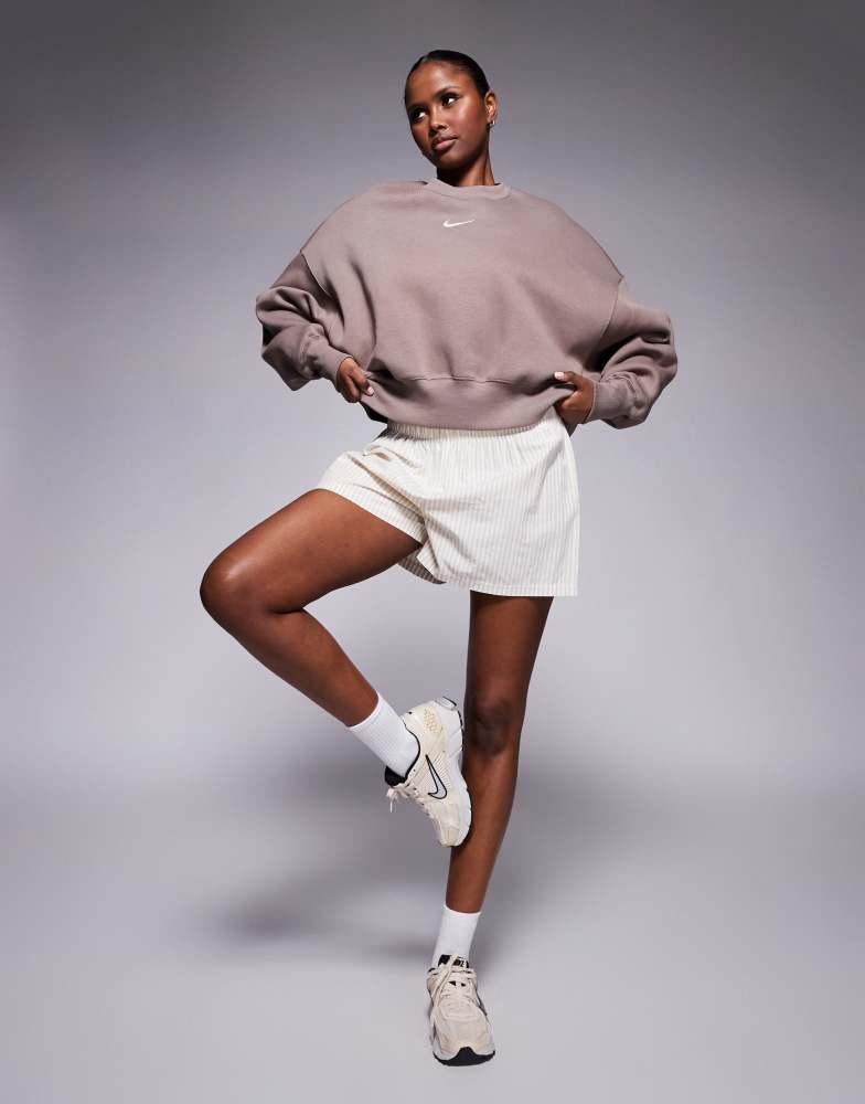 Shop Nike Phoenix Fleece over-oversized sweatshirt in brown on