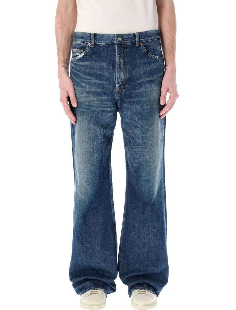 Yves Saint Laurent Saint Laurent Whiskering-Effect Distressed Bootcut Jeans 1