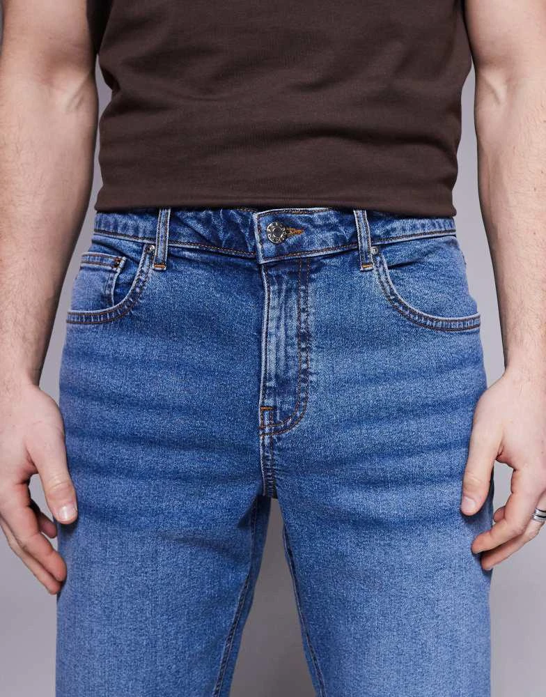 ASOS ASOS DESIGN slim fit jean in mid wash blue 5
