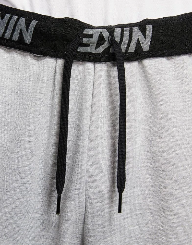 NIKE Nike Training Dri-FIT tapered fleece joggers in grey 4