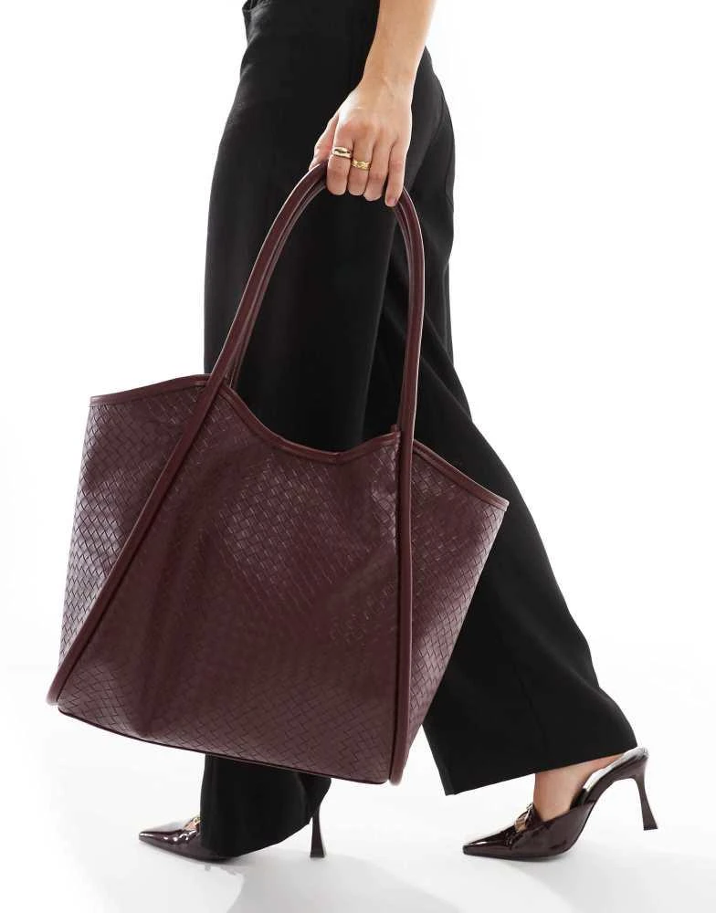 ASOS ASOS DESIGN weave tubular tote bag in burgundy 1