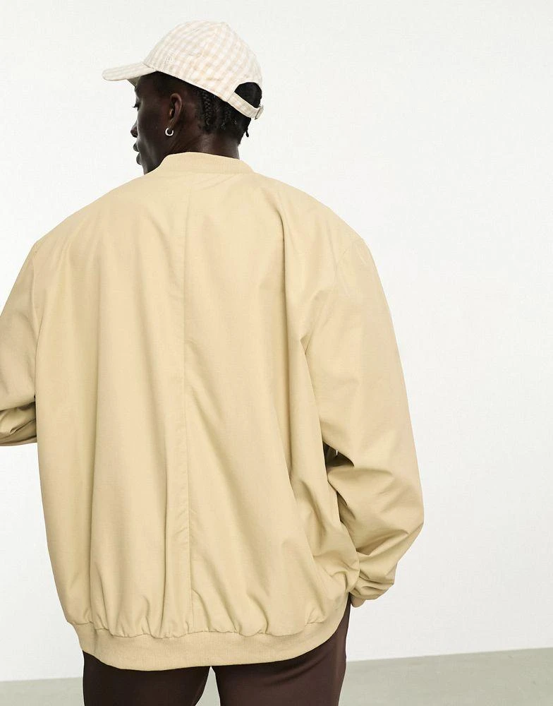 ASOS ASOS DESIGN oversized bomber jacket in stone 2