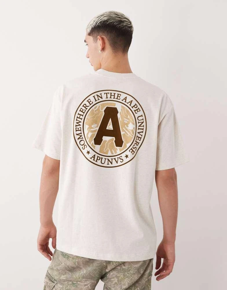 Shop Aape by A Bathing Ape boxy fit t-shirt in beige with chest