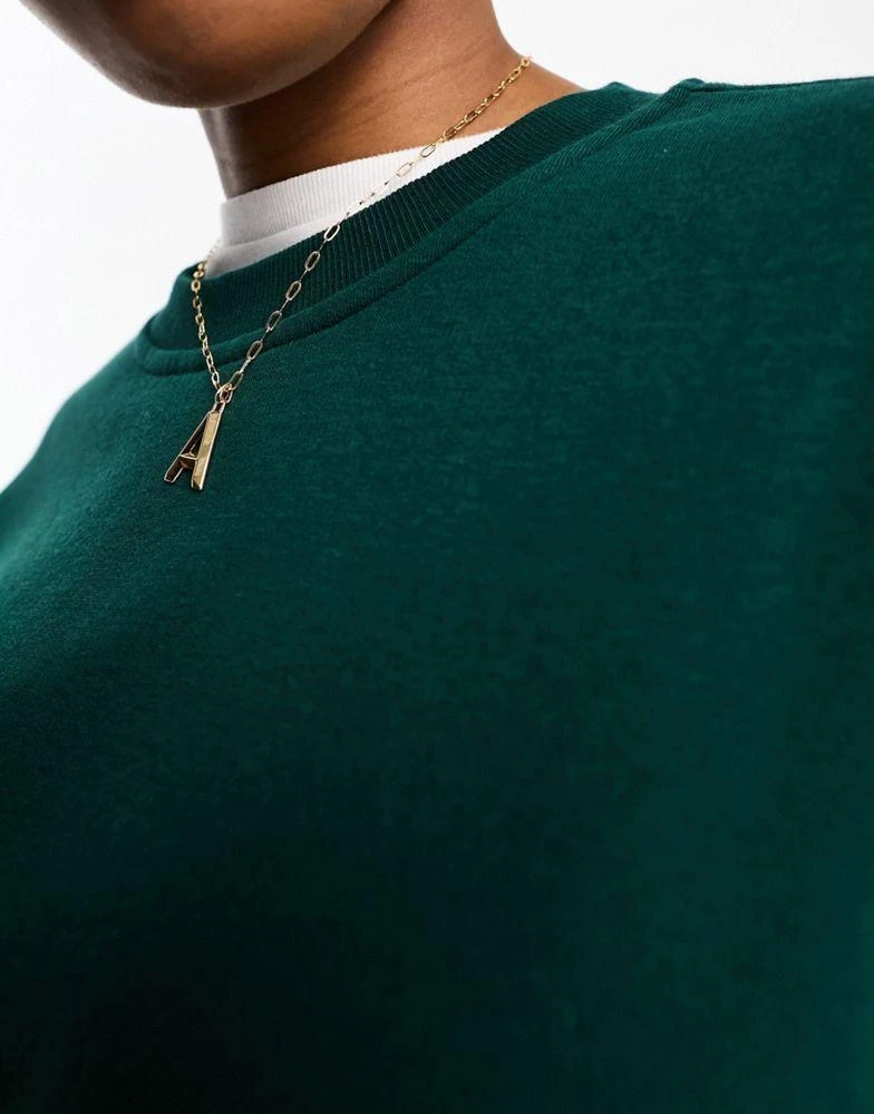 Monki Monki oversized sweatshirt in dark green 3
