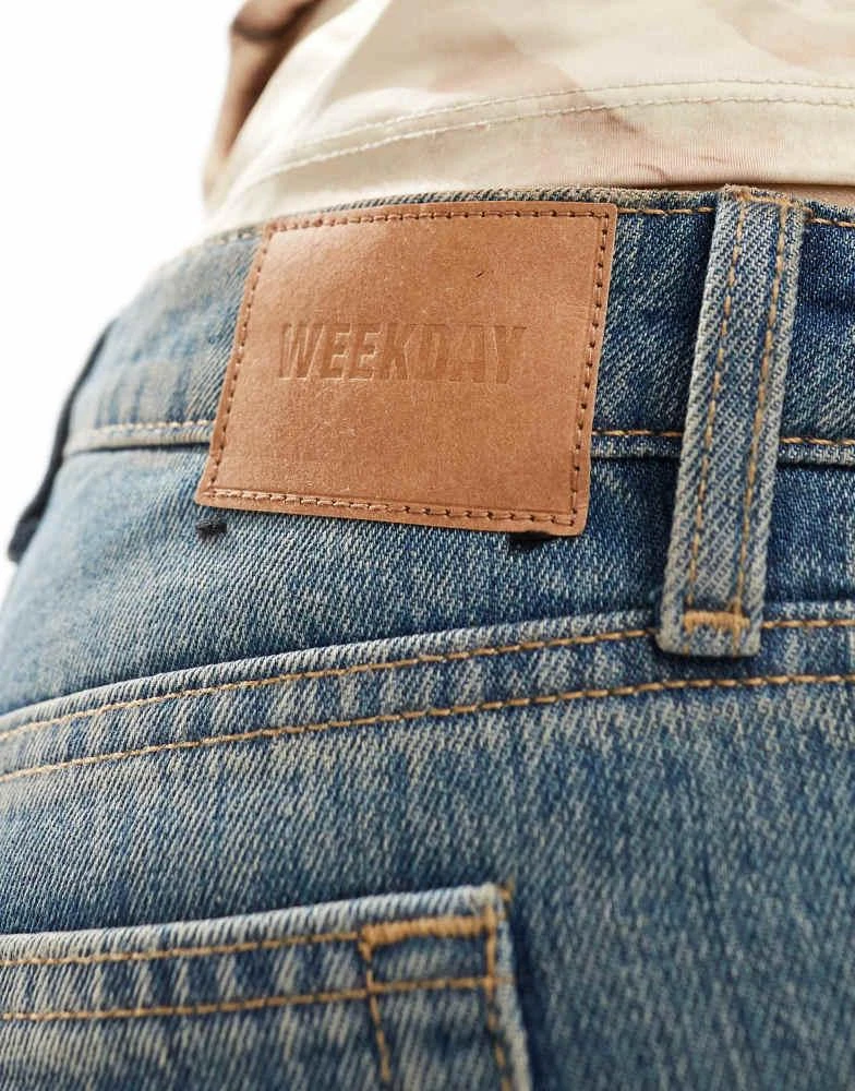 Weekday Weekday Nova low waist slim bootcut jeans in streaky blue wash 3