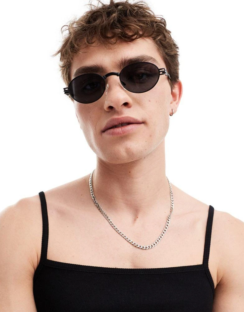 ASOS ASOS DESIGN 90's oval sunglasses with arm detail in black 1