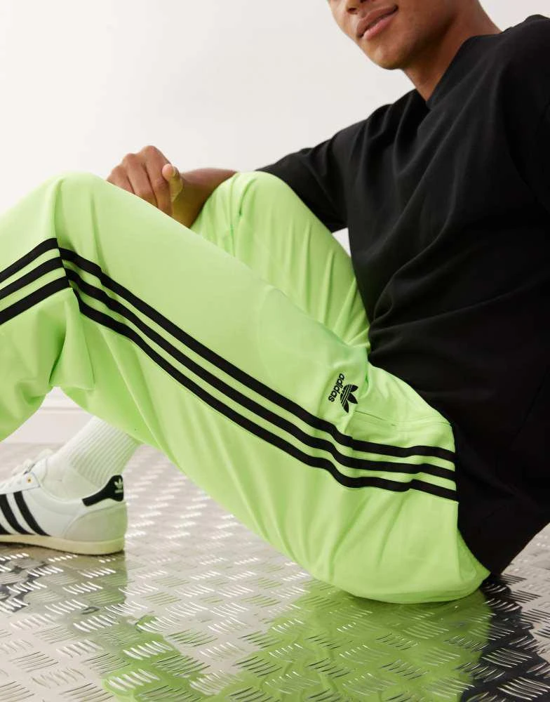 Adidas adidas Originals Firebird track pants in green and black 5
