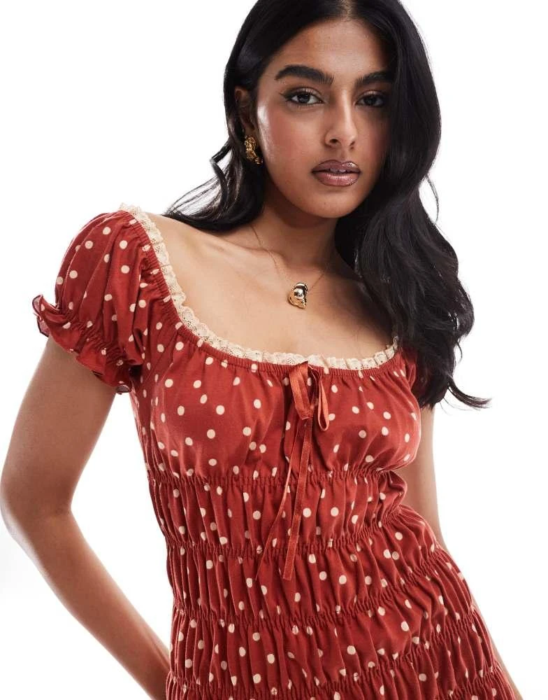 ASOS ASOS DESIGN polka dot shirred mini tea dress with tie front in red 2