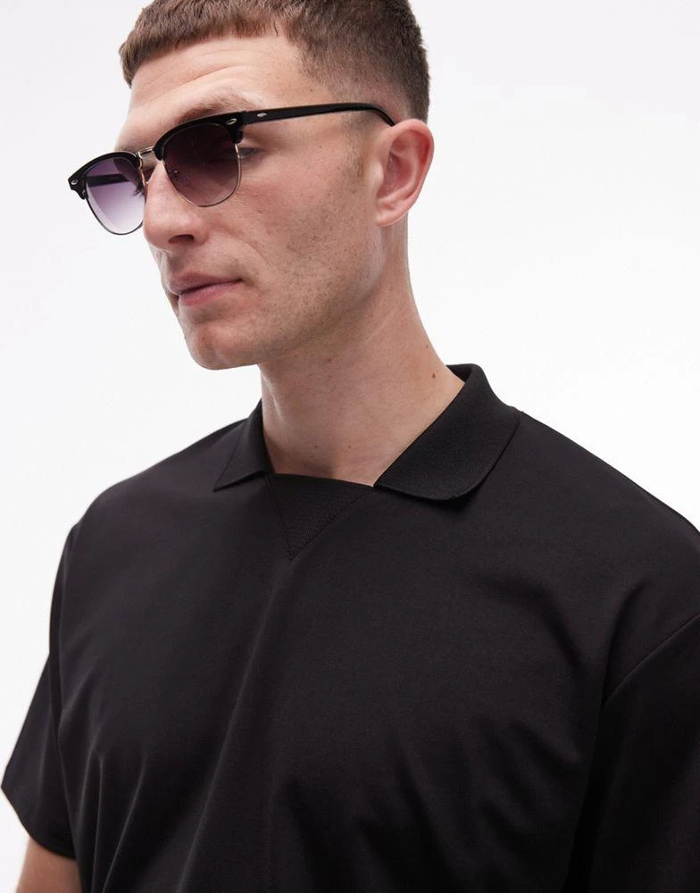 Topman Topman oversized fit retro polo in black 4