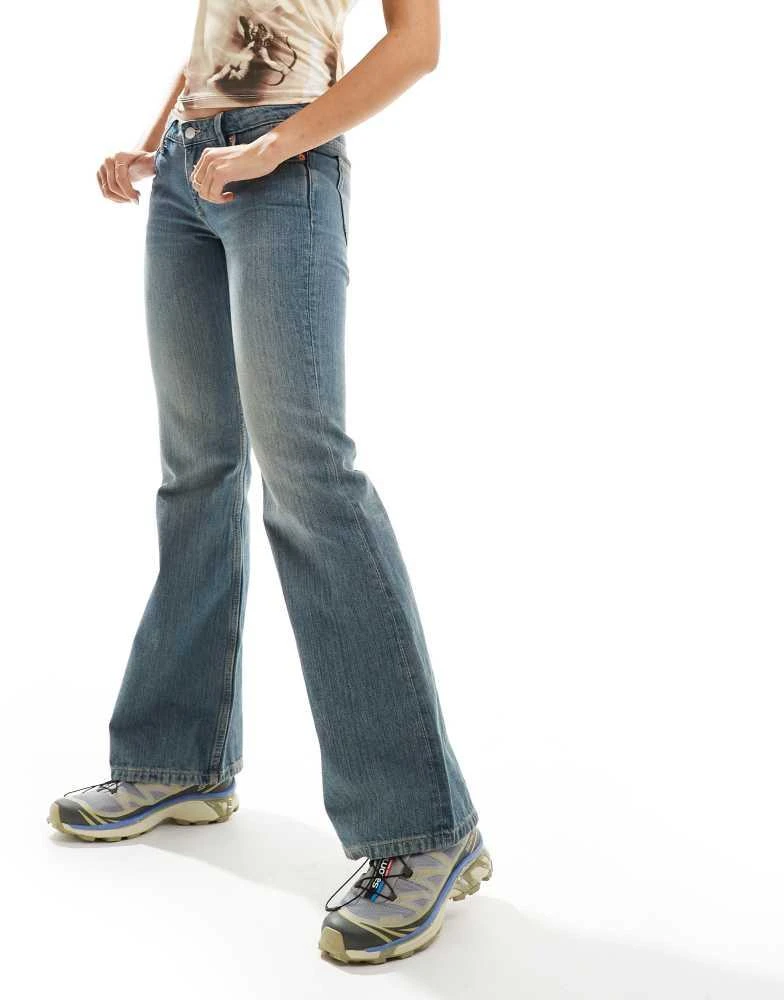Weekday Weekday Nova low waist slim bootcut jeans in streaky blue wash 4