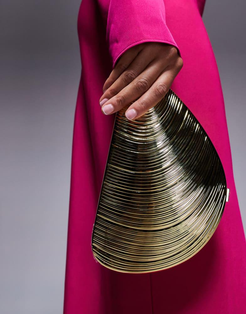 True Decadence True Decadence textured shell clutch bag in gold