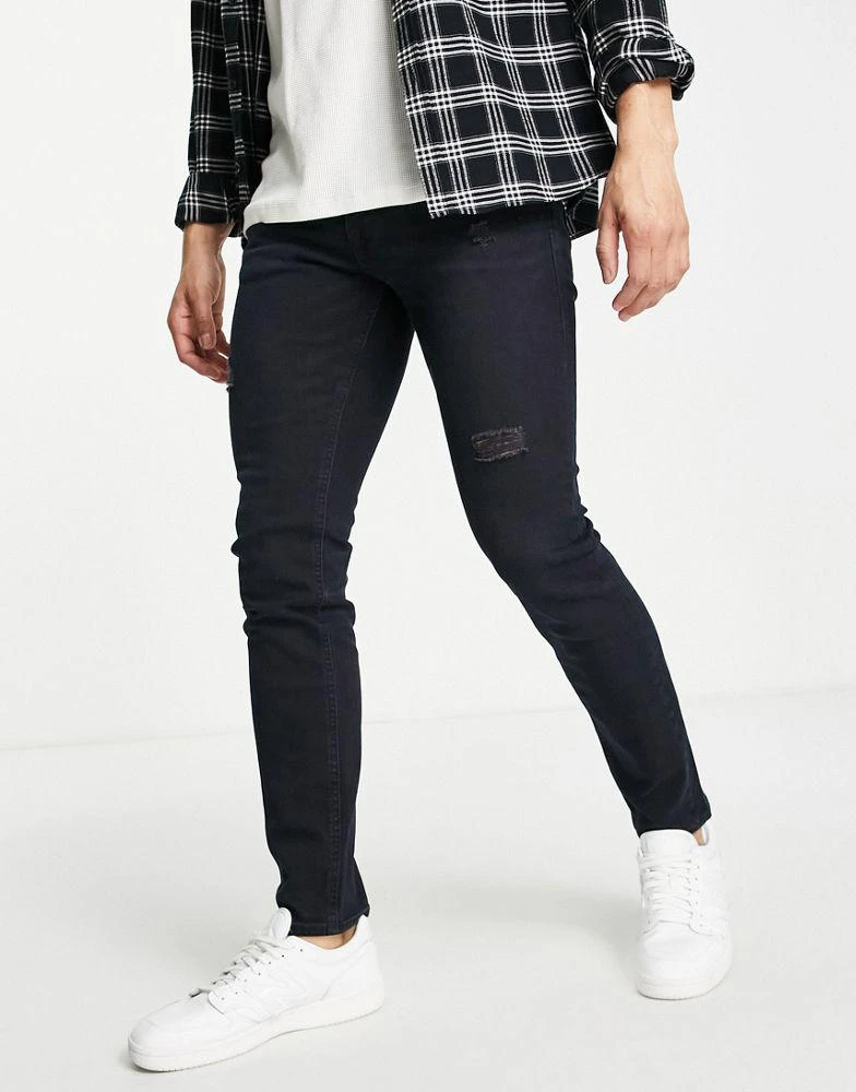 Jack & Jones Jack & Jones Intelligence Liam skinny fit jeans in black with rips 1
