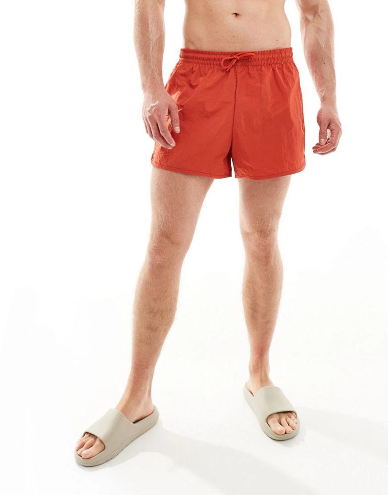 Weekday Weekday Tan runner swim shorts in red 3