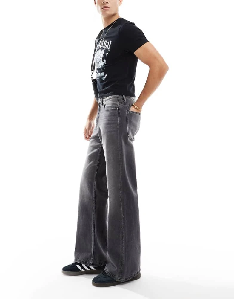 ASOS ASOS DESIGN wide flare jeans in washed black 3