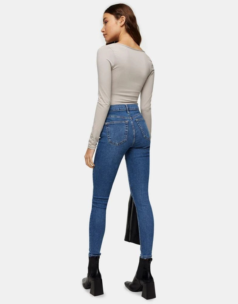 Topshop Topshop Jamie jeans with abraided hem detailing in mid blue  2