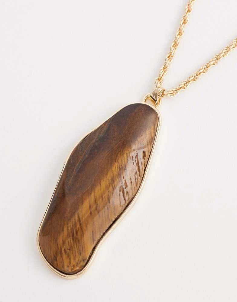 Reclaimed Vintage Reclaimed Vintage longline semi precious tigers eye pendant in gold 4