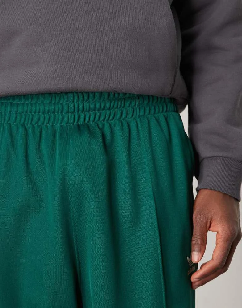 Adidas adidas Originals Firebird Loose track pants in green 5