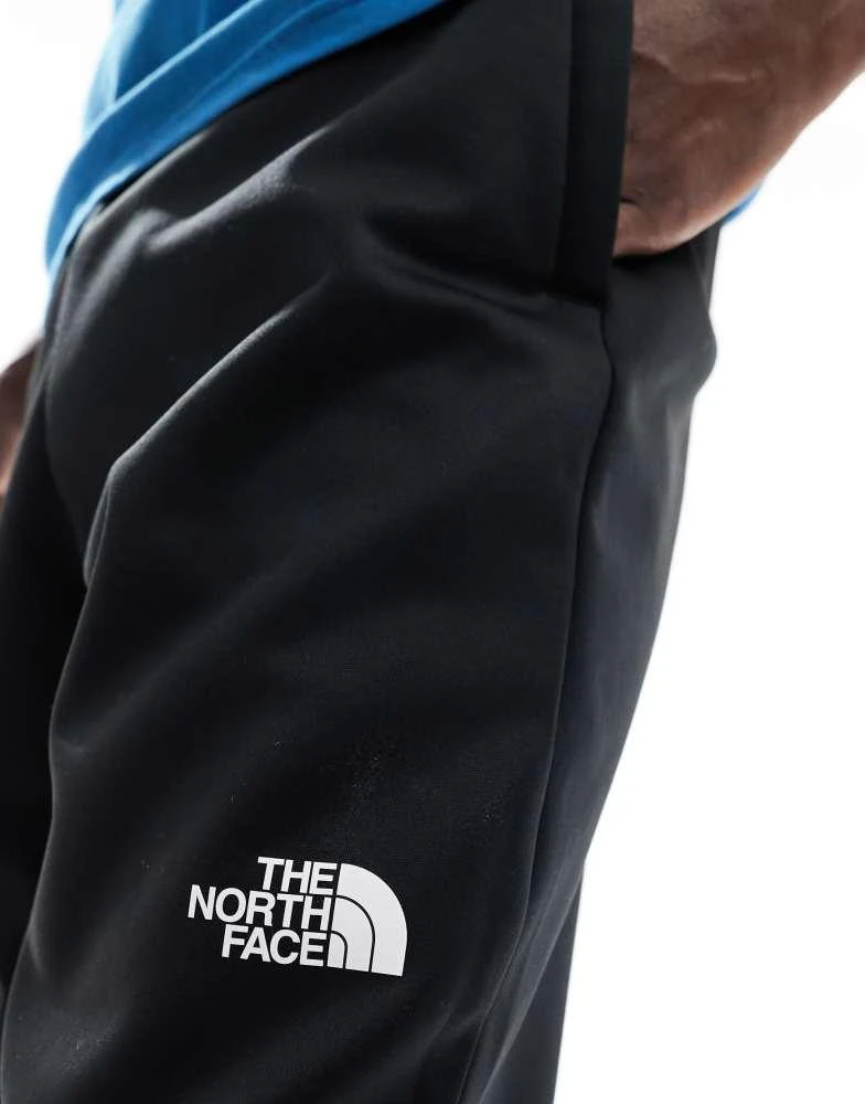 The North Face The North Face Training Reaxion fleece joggers in black 5