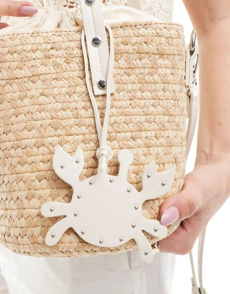 Stradivarius Stradivarius mini raffia bucket bag in beige 2