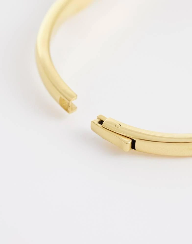 Abbott Lyon Abbott Lyon twisted knot bangle in 18k plated stainless steel in gold 2