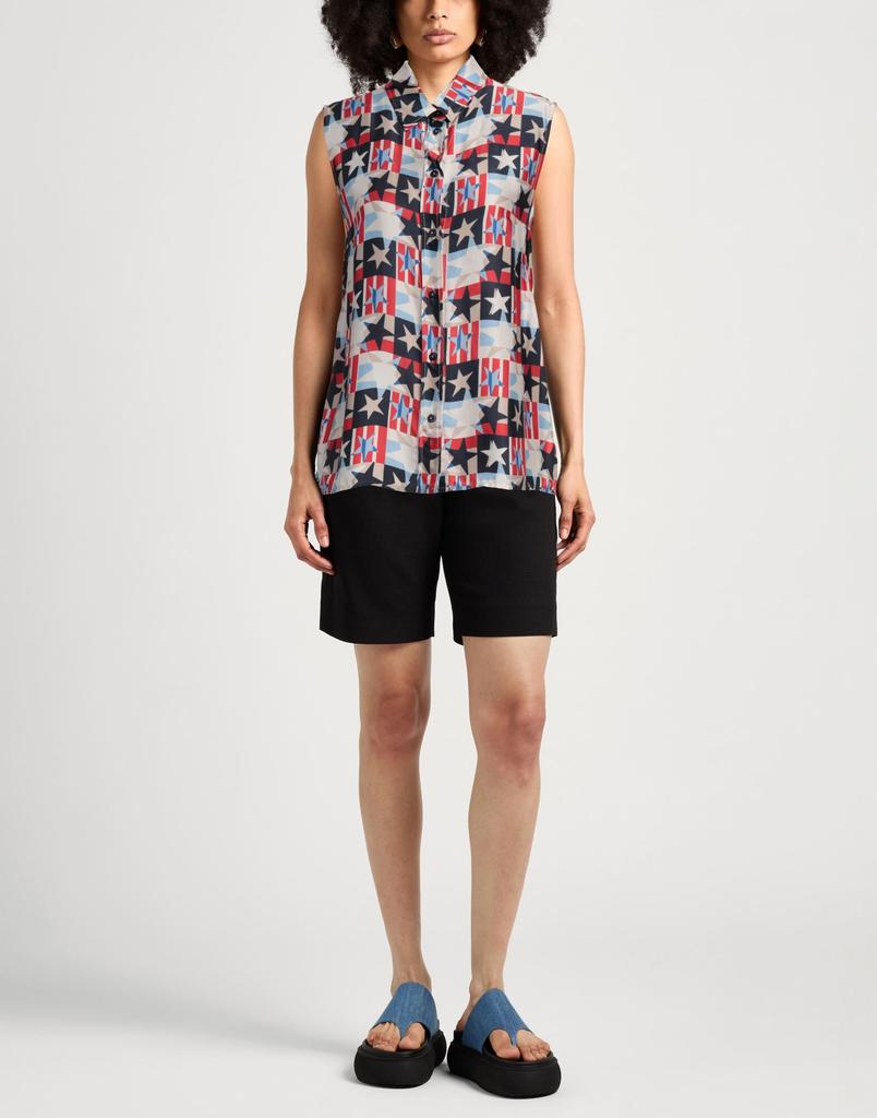 CARACTÈRE Top