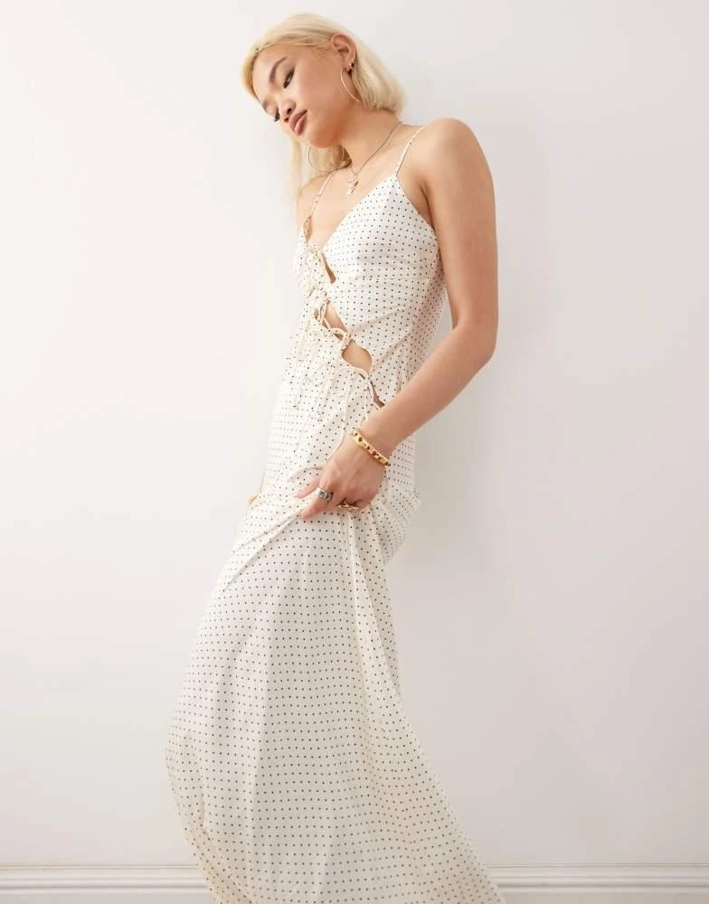 Lioness Lioness About A Girl asymmetric bow tie cutout detail satin maxi dress in white polka dot 2