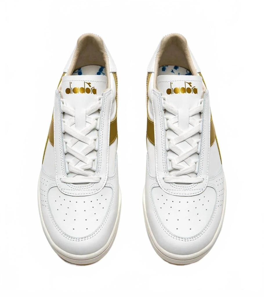 Shop Men's B Elite Sneakers In Gold on Sale at BeyondStyle – Get