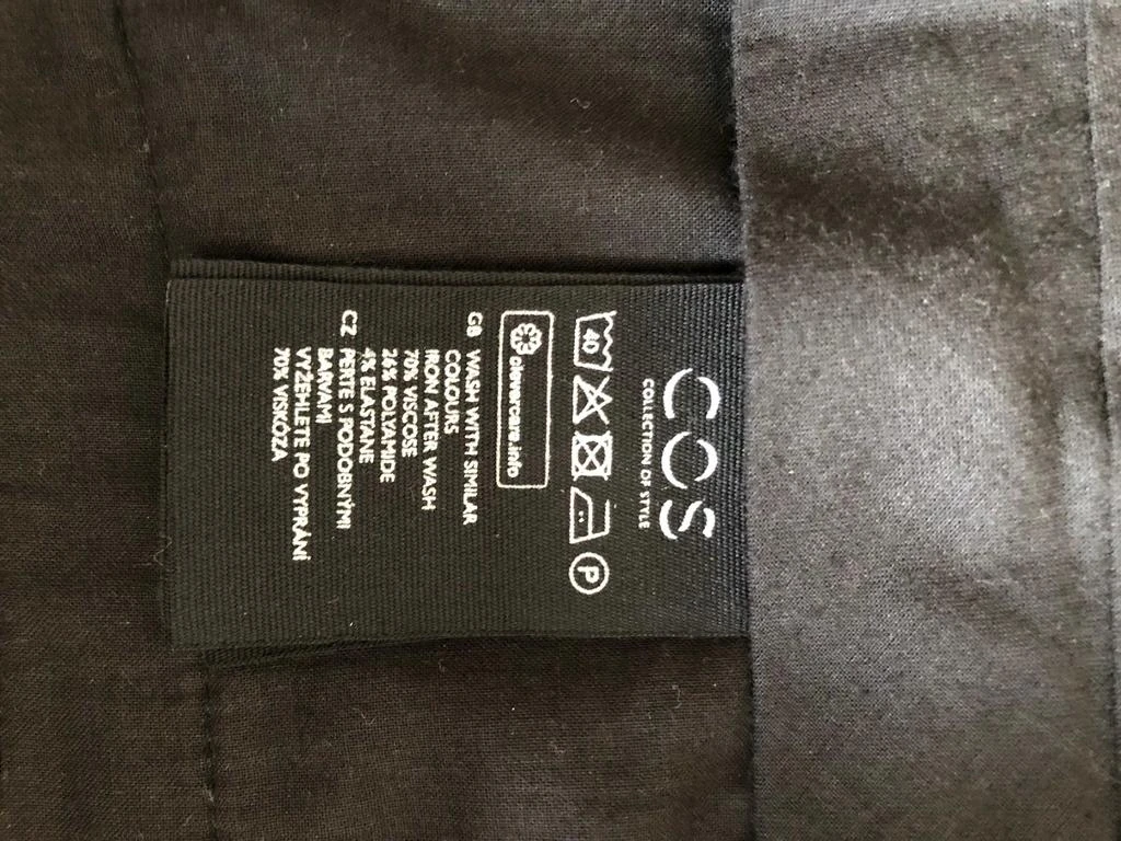 cos Loose fitting trousers with front pockets 6