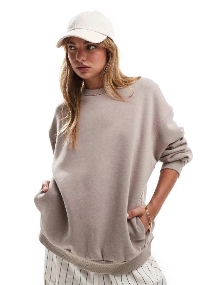 Bershka Bershka oversized sweatshirt in sand 1