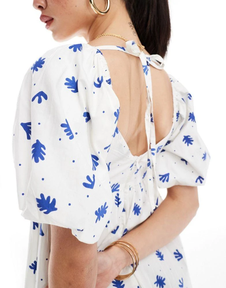 Shop Wednesday's Girl floral print puff sleeve mini smock dress in white  and blue on Sale at BeyondStyle  Get 60% Off Wednesday's Girl floral print  puff sleeve mini smock dress in