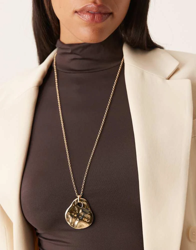 ASOS ASOS DESIGN statement necklace with molten pendant in gold tone