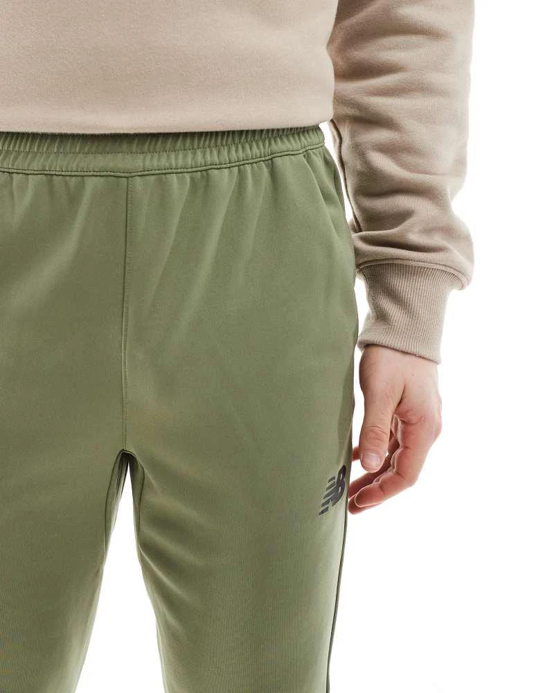New Balance New Balance Tenacity knit training pant in green 5